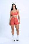 Short Fitness Slim Páprica compressão sem empina bumbum - Maré Maria moda fitness