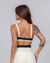 Top Fitness Flow Duo Super Black com Off White - Maré Maria moda fitness