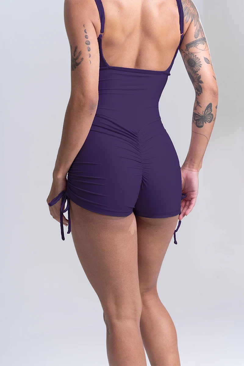 Macaquinho Fitness New Pérola Violeta Maré Maria – frente com alças reguláveis e pala na cintura