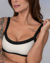 Top Fitness Flow Duo Off White com Super Black - Maré Maria moda fitness