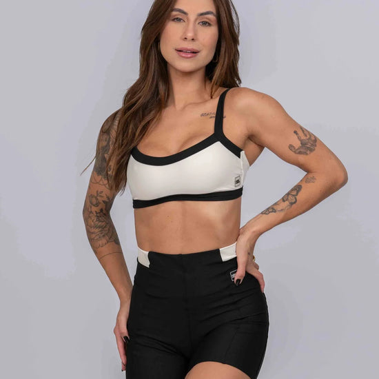 Top Fitness Flow Duo Off White com Super Black - Maré Maria moda fitness