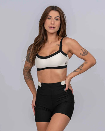 Top Fitness Flow Duo Off White com Super Black - Maré Maria moda fitness