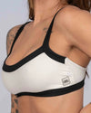 Top Fitness Flow Duo Off White com Super Black - Maré Maria moda fitness